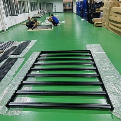 বহিরঙ্গন ক্যাম্পিং কার্যক্রমের জন্য কালো রঙের কাস্টম ভ্যান পার্টস ক্যাম্পার ভ্যান ছাদ র্যাক প্ল্যাটফর্ম